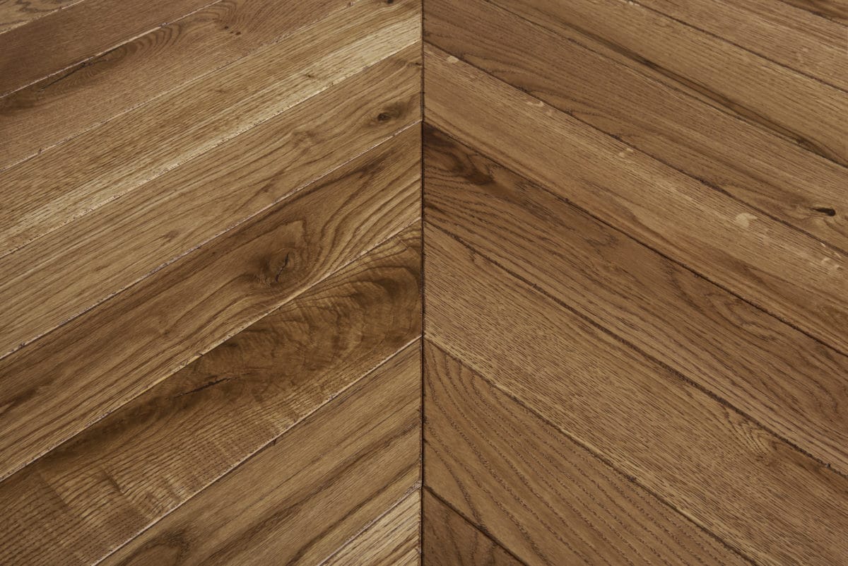 HAUSSMAN detail solid wood laminate chevron Design Parquet